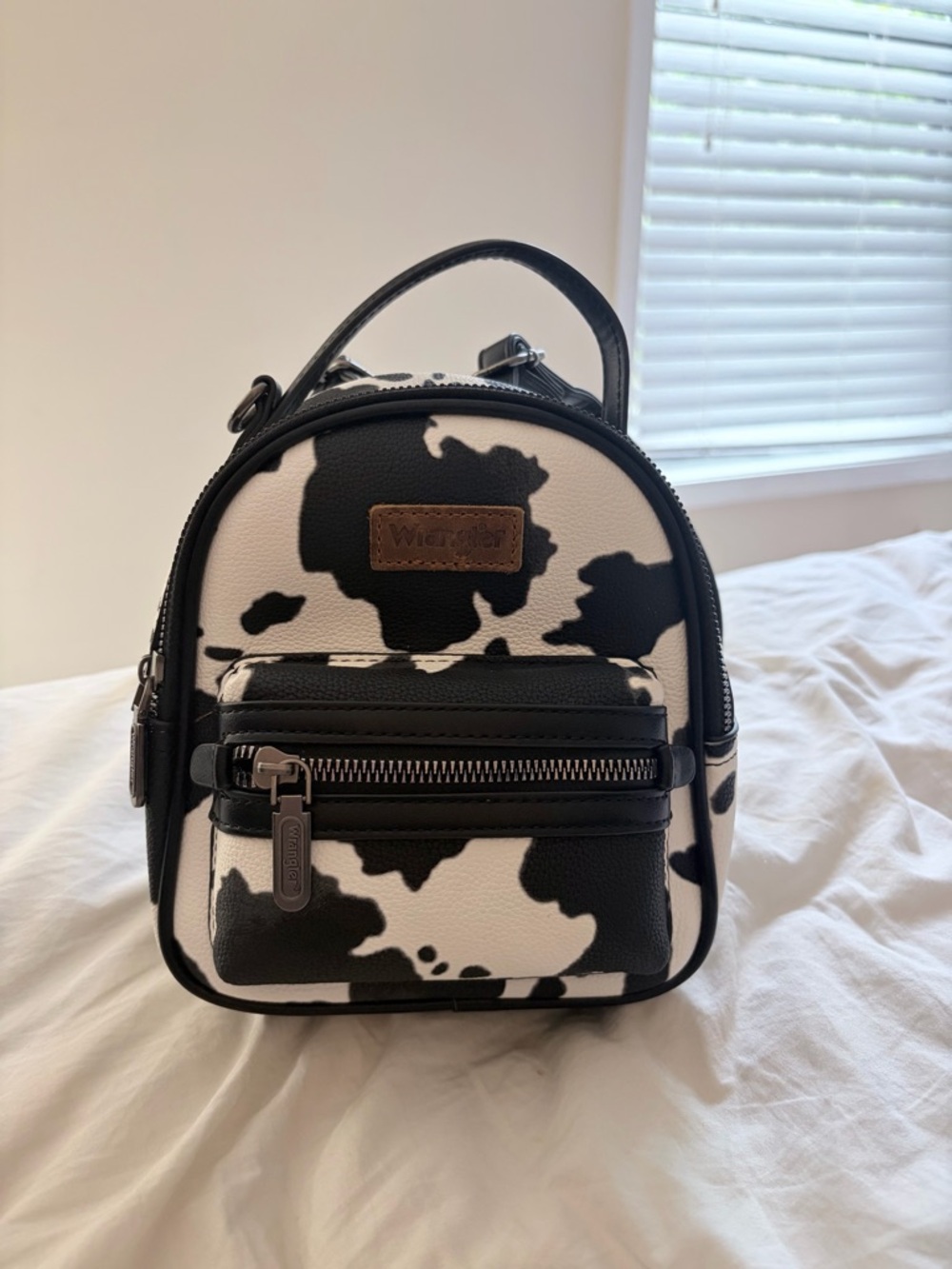Wrangler Mini Cow-Print Backpack in Black & White